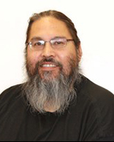 board member Dr. Thomas Walker